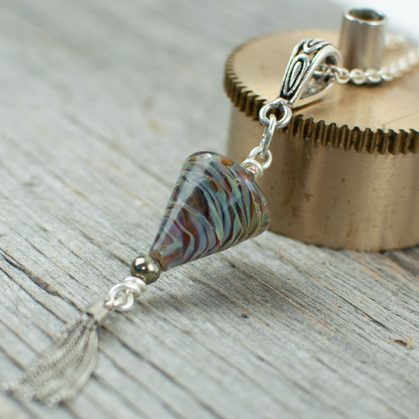 Mahogany striped cone shaped borosilicate glass and silver tassel necklace