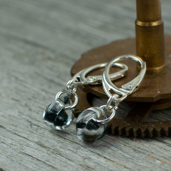 Black borosilicate glass teardrop and silver earrings